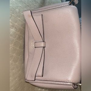 Light lavender/gray crossbody kate spade bag! Small spot on front of bag,